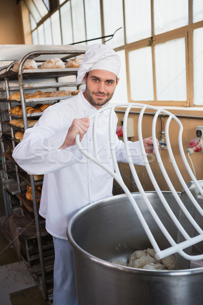 Baker preparing dough in industrial mixer Stock photo © wavebreak_media