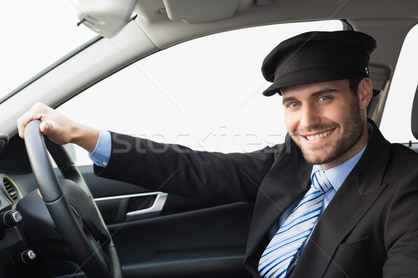Przystojny kierowca uśmiechnięty kamery samochodu garnitur Zdjęcia stock © wavebreak_media