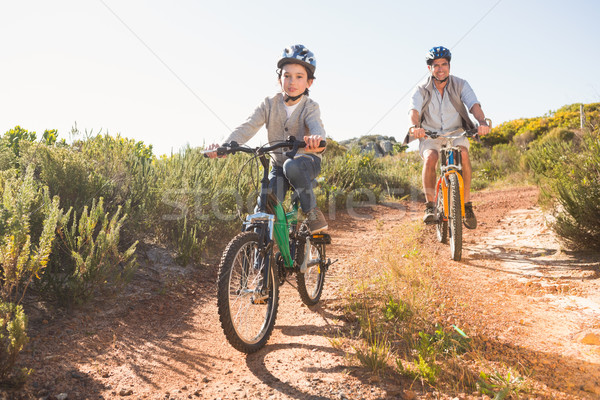 Father and son on a bike ride  Stock photo © wavebreak_media