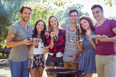 Heureux amis parc barbecue femme Photo stock © wavebreak_media
