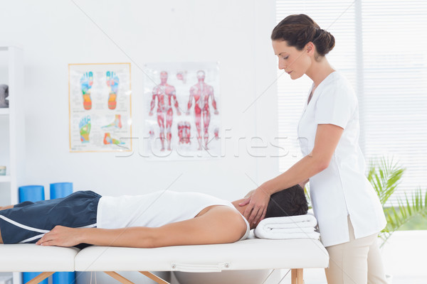 Człowiek szyi masażu medycznych biuro kobieta Zdjęcia stock © wavebreak_media