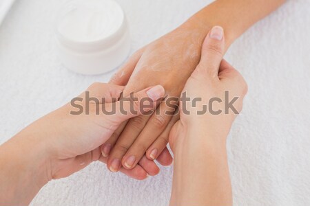 Mains crème table femme [[stock_photo]] © wavebreak_media