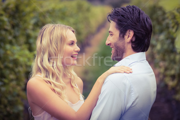 Young happy couple smiling at each other Stock photo © wavebreak_media