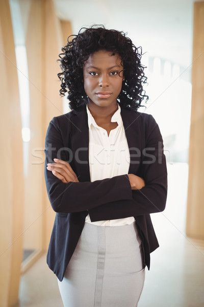 Portrait of executive standing with arms crossed Stock photo © wavebreak_media