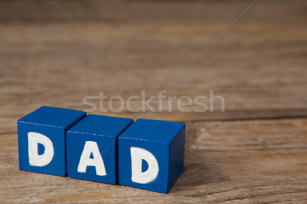 Blue cube shapes with white dad text on table Stock photo © wavebreak_media