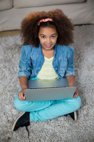 Portrait of girl using laptop Stock photo © wavebreak_media