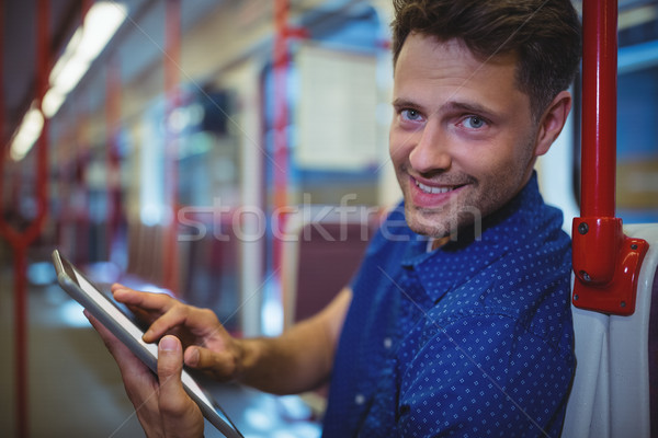 Porträt schöner Mann digitalen Tablet Zug Stock foto © wavebreak_media