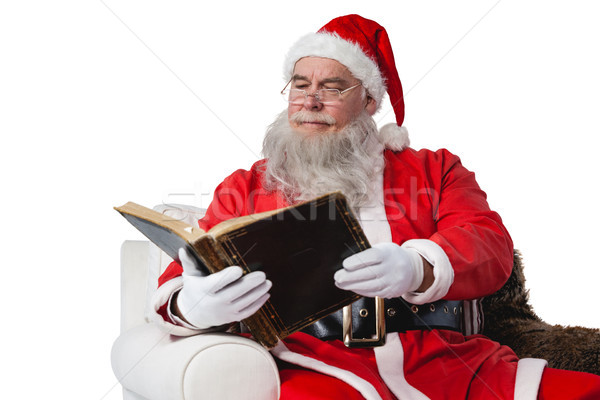 Mos craciun lectură Biblie alb om iarnă Imagine de stoc © wavebreak_media