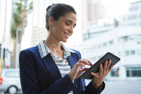 Business executive using digital tablet Stock photo © wavebreak_media
