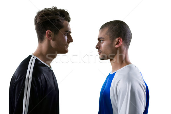 Two rival football player looking at each other Stock photo © wavebreak_media