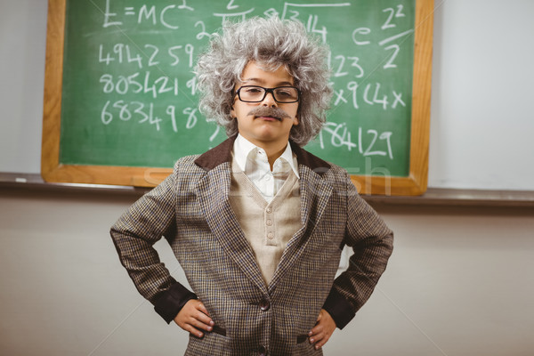 Little Einstein posing in front of chalkboard Stock photo © wavebreak_media