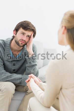 Husband giving pills to his wife with the flu Stock photo © wavebreak_media