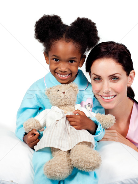 Lächelnd kleines Mädchen Krankenschwester schauen Kamera weiß Stock foto © wavebreak_media