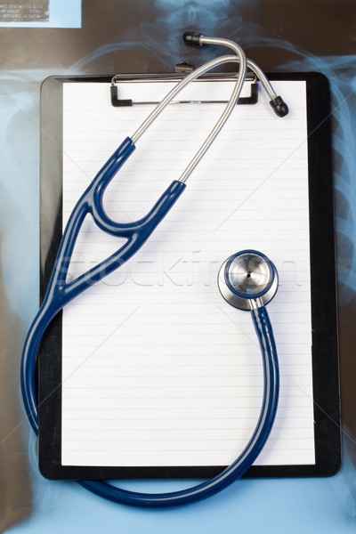 Nota azul estetoscopio oscuro médico médicos Foto stock © wavebreak_media