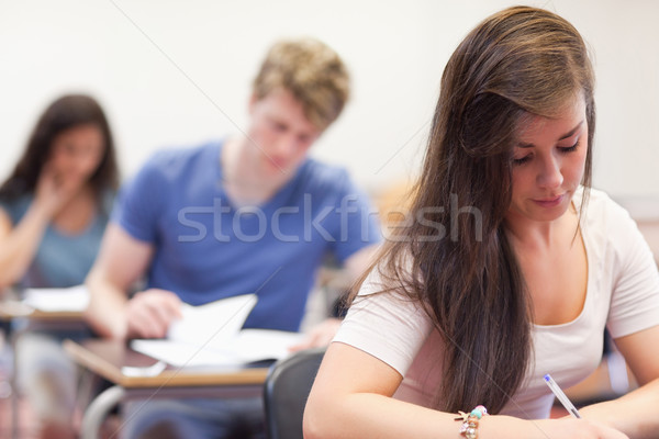 Bonne recherche élèves test classe femme heureux [[stock_photo]] © wavebreak_media
