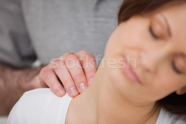 Close-up of a woman being massaged by a physiotherapist in a room Stock photo © wavebreak_media
