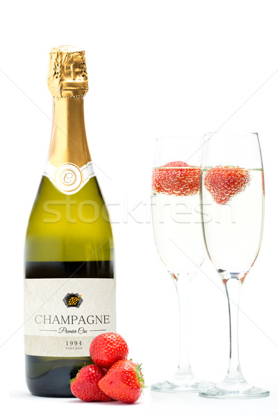 üveg pezsgő kettő fuvolák lebeg eprek Stock fotó © wavebreak_media