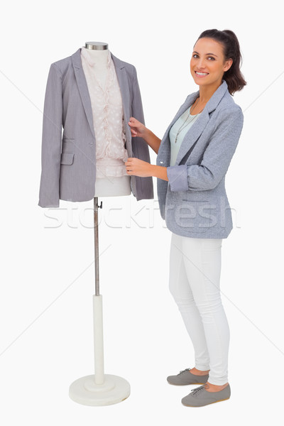 Fashion designer fixing blazer on mannequin Stock photo © wavebreak_media