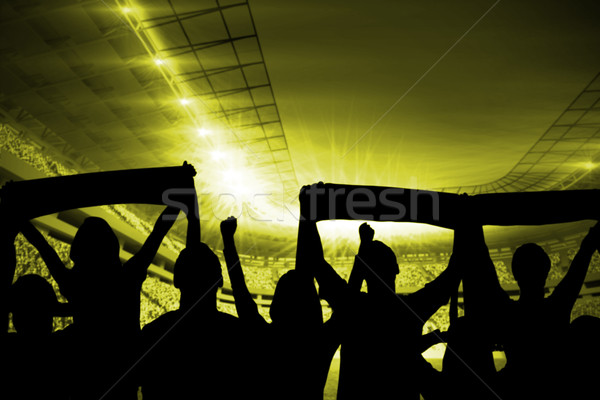 Silhouettes football stade football bleu nuit [[stock_photo]] © wavebreak_media