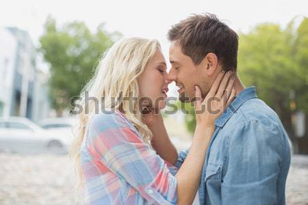 Hip young couple smiling at each other Stock photo © wavebreak_media