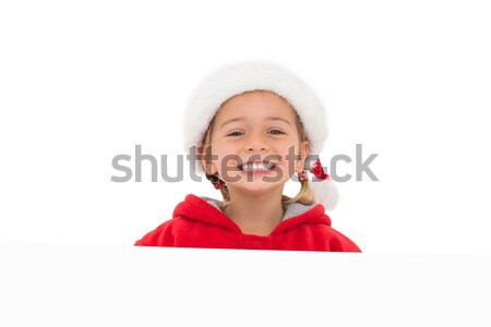 Stock photo: Festive little girl showing poster