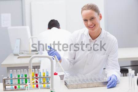 Scientist in protective suit doing experimentations  Stock photo © wavebreak_media