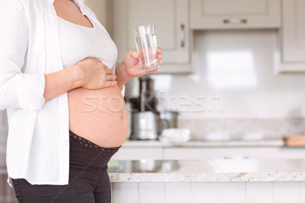 Hamile kadın su ev mutfak hamile Stok fotoğraf © wavebreak_media