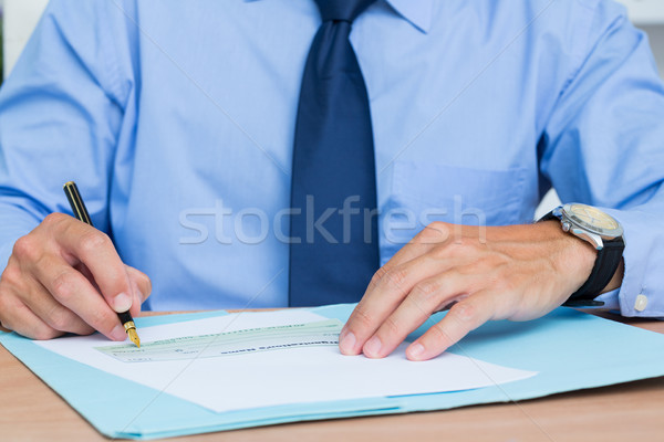 ビジネスマン 書く 署名 男 ペン 表 ストックフォト © wavebreak_media