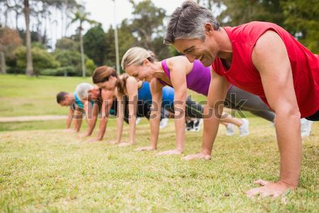 Group of fit women exercising in the boot camp Stock photo © wavebreak_media