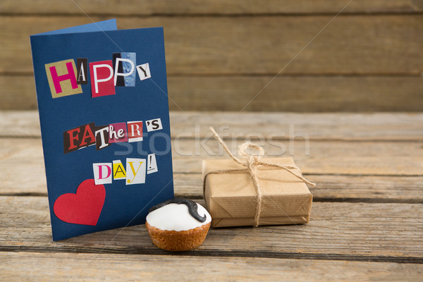 Stock photo: Happy fathers day greeting card with gift box on table