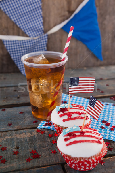Decorated cupcakes and cold drink with 4th july theme Stock photo © wavebreak_media
