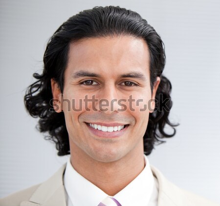 Mosolyog fiatal üzletember fehér öltöny vállalati Stock fotó © wavebreak_media