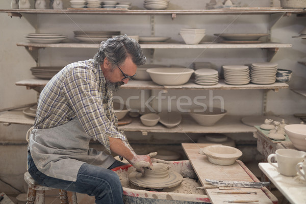 Male potter molding a clay Stock photo © wavebreak_media