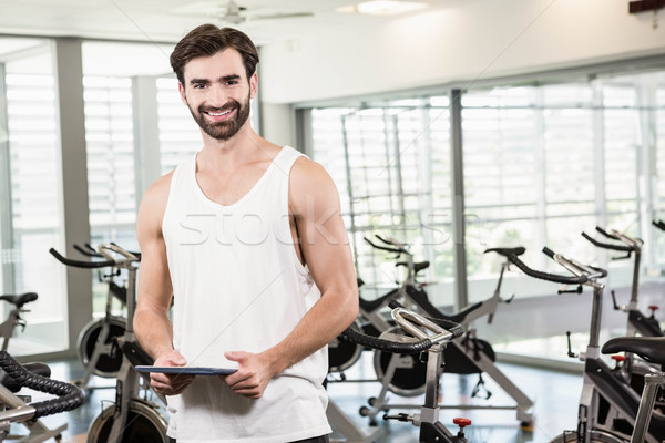 Lächelnd Mann halten Tablet Fitnessstudio Sport Stock foto © wavebreak_media