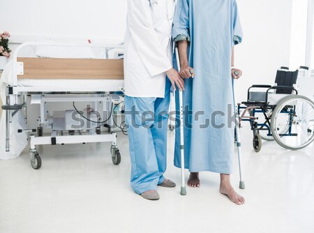 Tensed male surgeon sitting in ward Stock photo © wavebreak_media