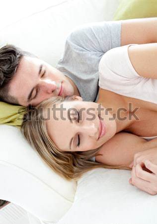 Portrait souriant couple dormir lit maison [[stock_photo]] © wavebreak_media