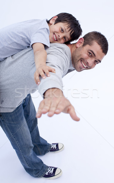 Smiling father and son playing together Stock photo © wavebreak_media