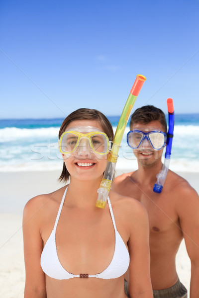 情侶 面膜 海灘 女子 男子 比基尼泳裝 商業照片 © wavebreak_media