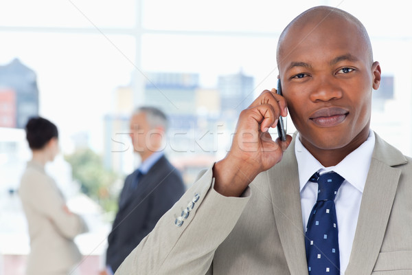 Stock foto: Jungen · ernst · Executive · Anzug · sprechen · Telefon