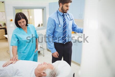 Smiling nurse next to a transfused patient Stock photo © wavebreak_media