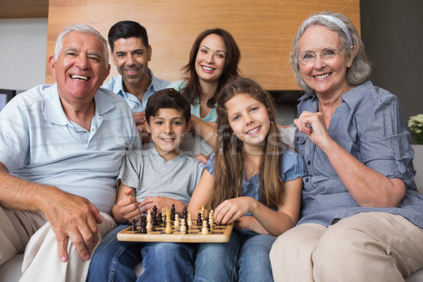 Porträt glücklich Großfamilie spielen Schach Wohnzimmer Stock foto © wavebreak_media