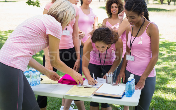 Participants registering for breast cancer campaign Stock photo © wavebreak_media
