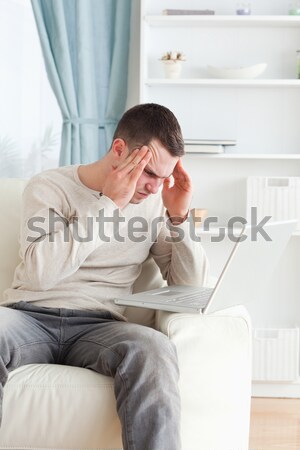 Stock photo: Doctor holding asthma inhaler with boy in hospital