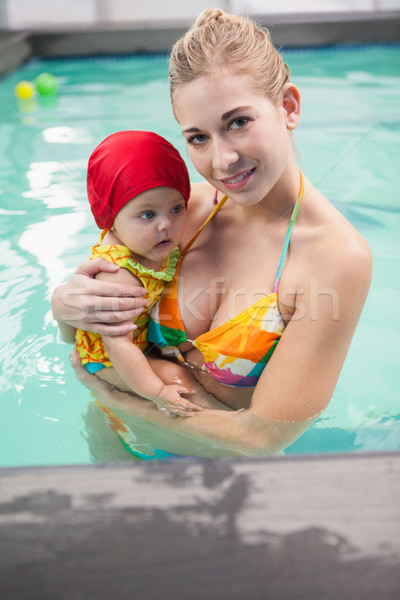 Pretty mother and baby at the swimming pool Stock photo © wavebreak_media