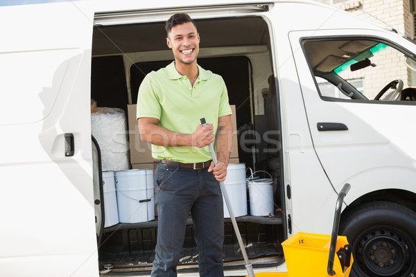 Cleaning agent standing smiling at camera Stock photo © wavebreak_media