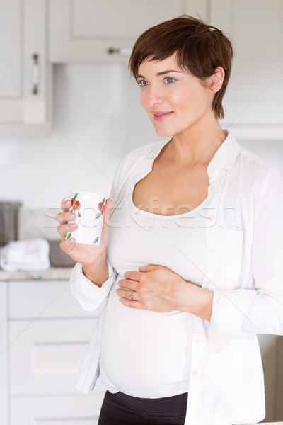 Foto d'archivio: Donna · incinta · bevanda · calda · home · cucina · felice · incinta