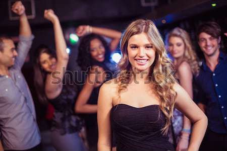Cheerful friends taking selfie while enjoying at nightclub Stock photo © wavebreak_media