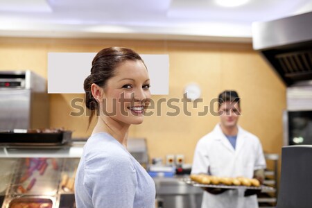 Man interacting with waitress at counter Stock photo © wavebreak_media