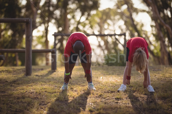 Gyerekek előad nyújtás testmozgás akadályfutás csizma Stock fotó © wavebreak_media
