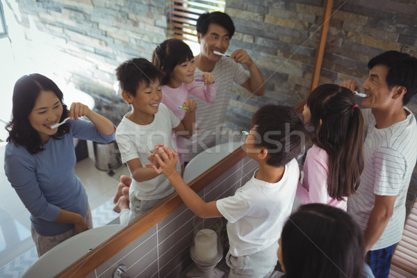 Famille ensemble salle de bain maison enfant [[stock_photo]] © wavebreak_media